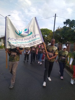 Walkers carrying the McClelland Adult Centre banner during the Annual Big Walk