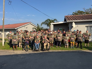 McClelland residents wearing their new donkey Big Walk T-shirts